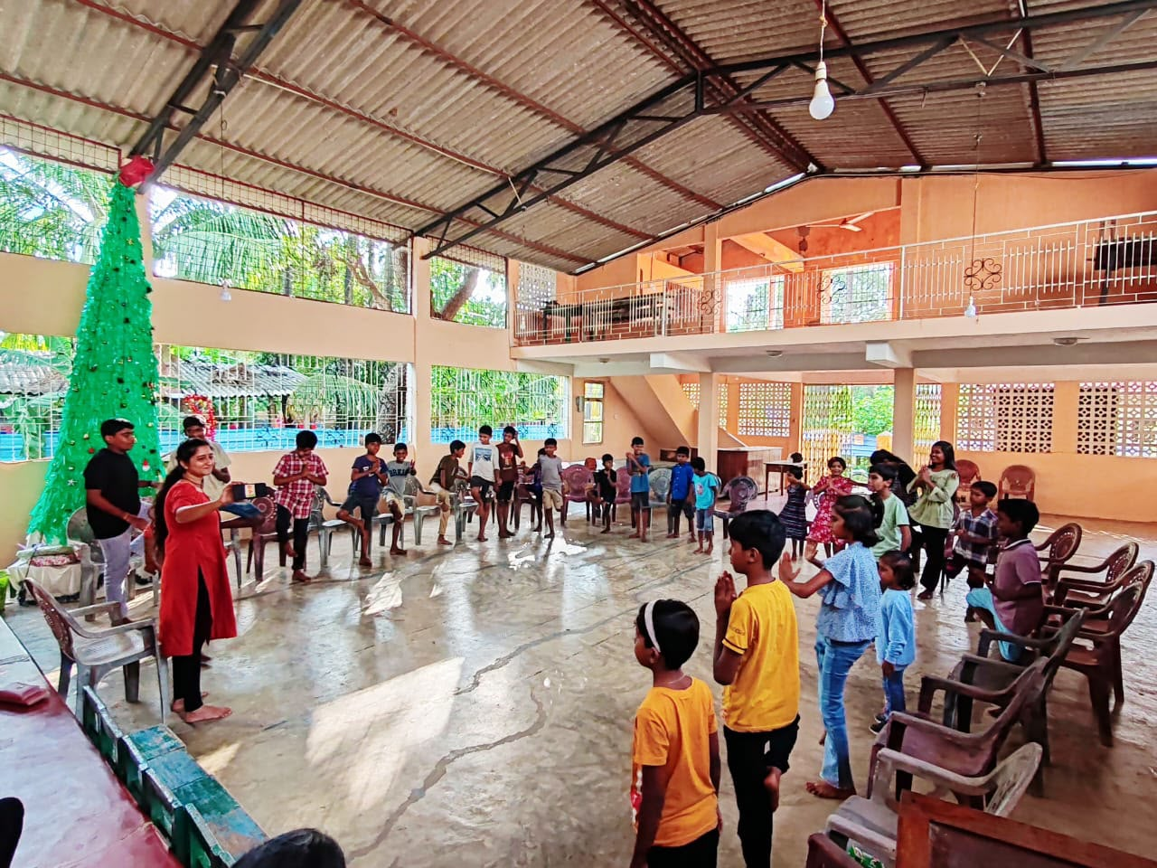 Children and mentors in a life-skills activity